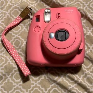 Pink instax mini 9 camera